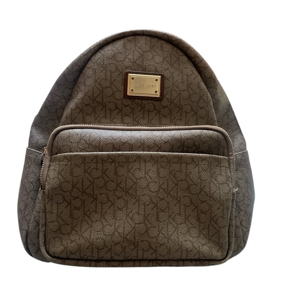 Calvin Klein Handbags - Calvin Klein Brown Monogram Backpack